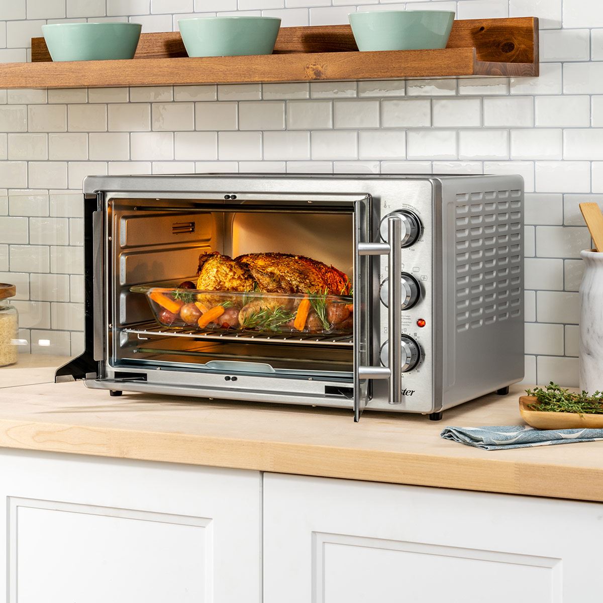 Horno eléctrico OSTER , puerta francesa C freid