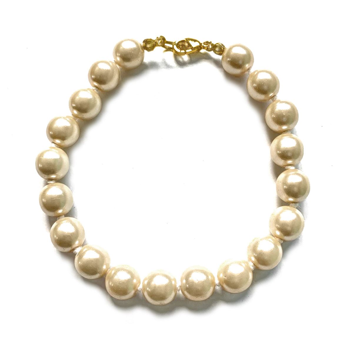 Pulsera nudo clásico crema ACEMOR