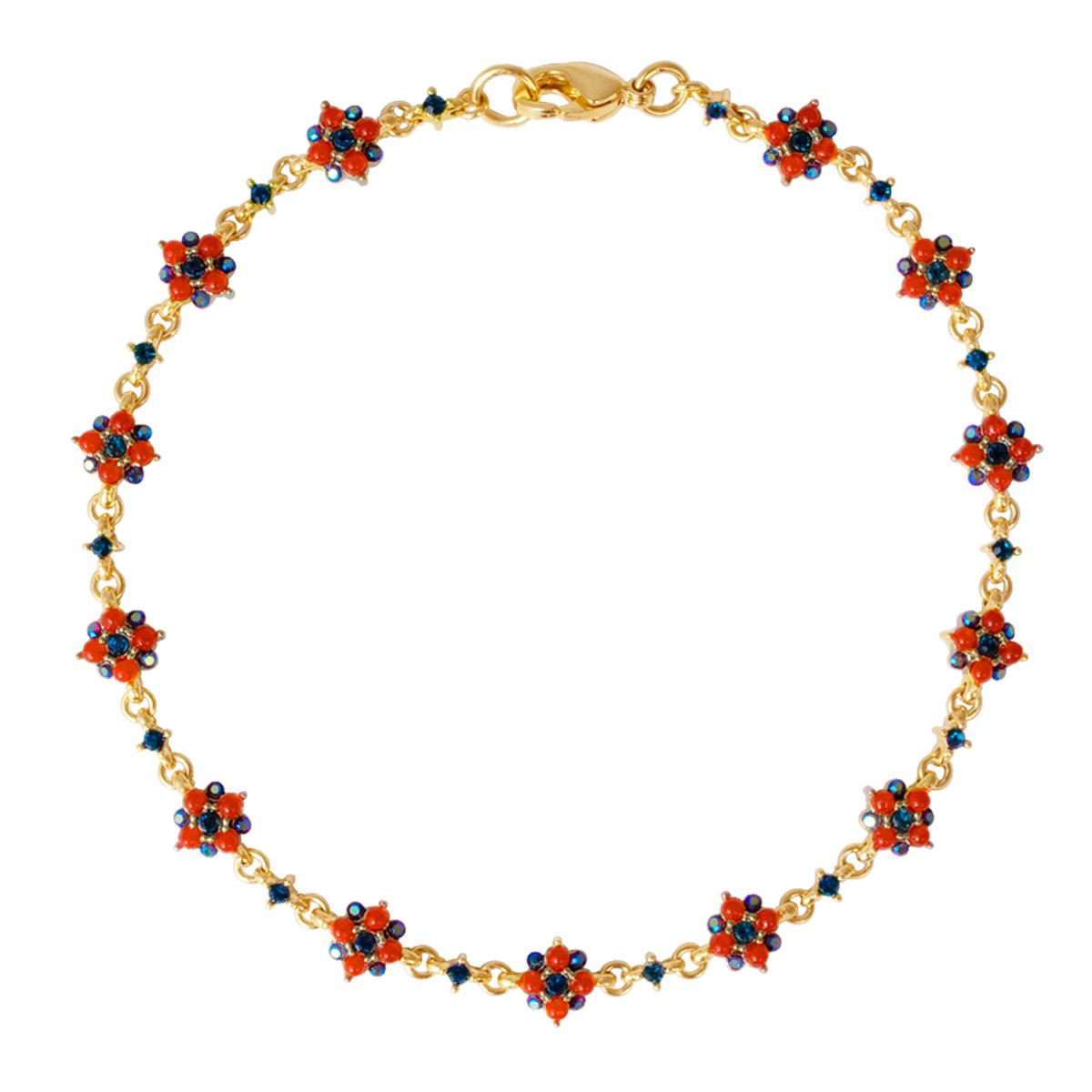 Pulsera en dorado con perlitas coral y cristales  zafiro Carré