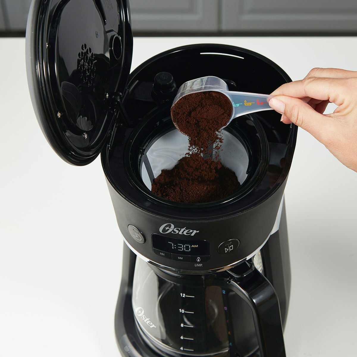 Cafetera Programable para 12 Tazas Sistema Colores Oster