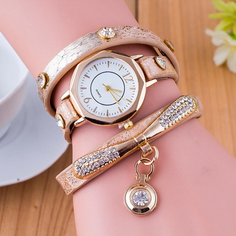Reloj pulsera brazalete para dama en color beige-sofistik2