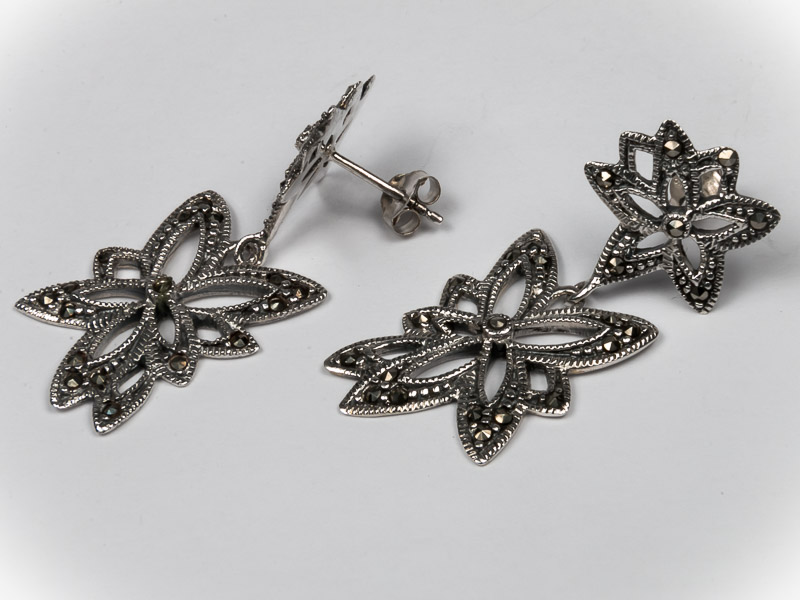 Aretes doble flor de plata .925 con marquesita