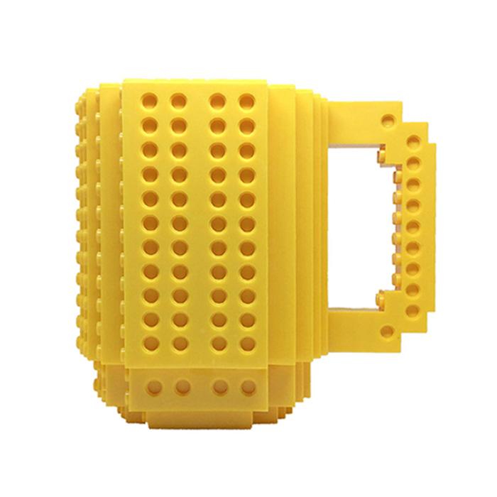 Taza para café, Fashion Electronics TAZA con bloques de construcción de diferentes colores (incluye al azar 1 personaje o 1 carrito o bloques de construcción) Amarilla