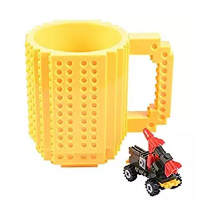Taza para café, Fashion Electronics TAZA con bloques de construcción de diferentes colores (incluye al azar 1 personaje o 1 carrito o bloques de construcción) Amarilla