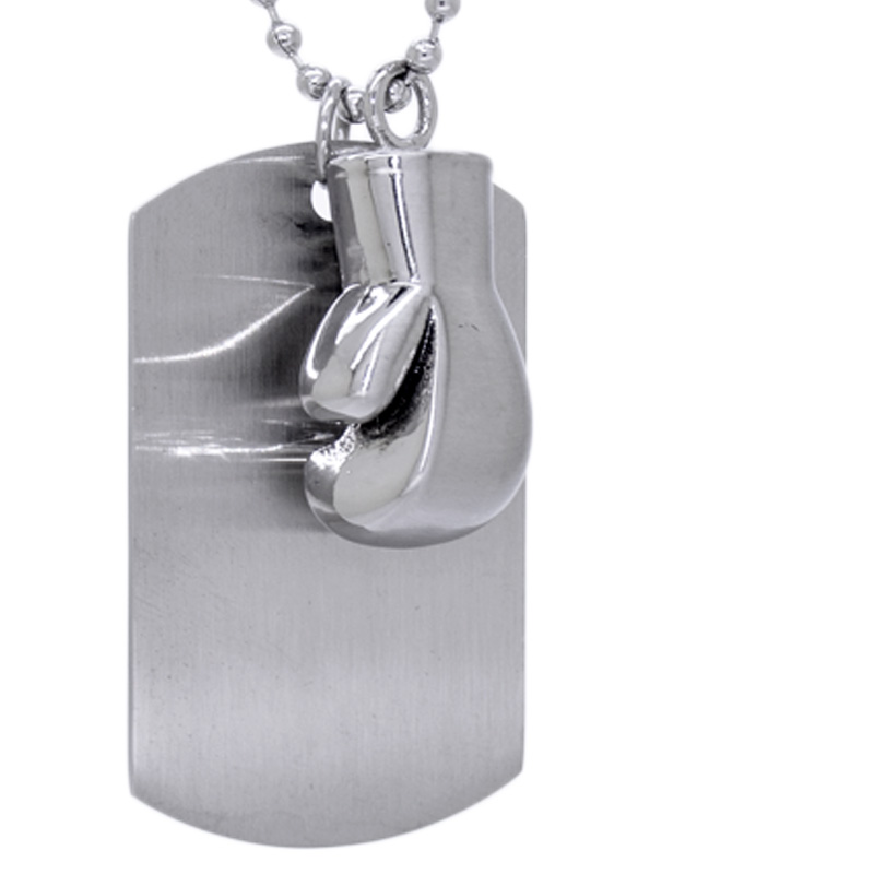 Dije de guante de box con placa lisa en acero inoxidable. 