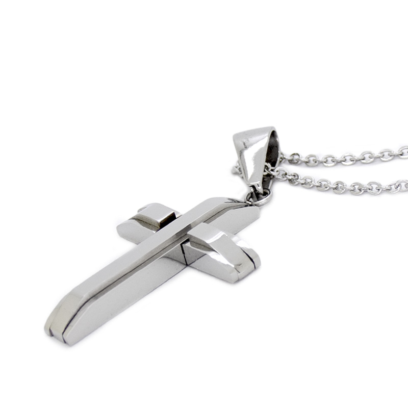 Dije Acero NK de cruz.