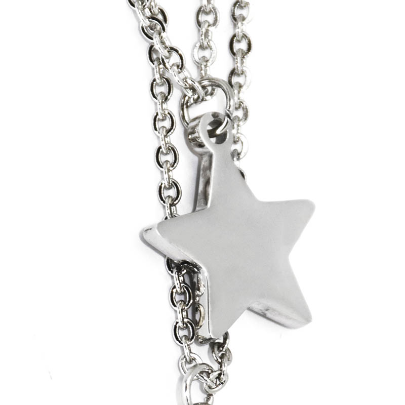 Collar Acero NK con dije de estrella y de cáliz con piedras.