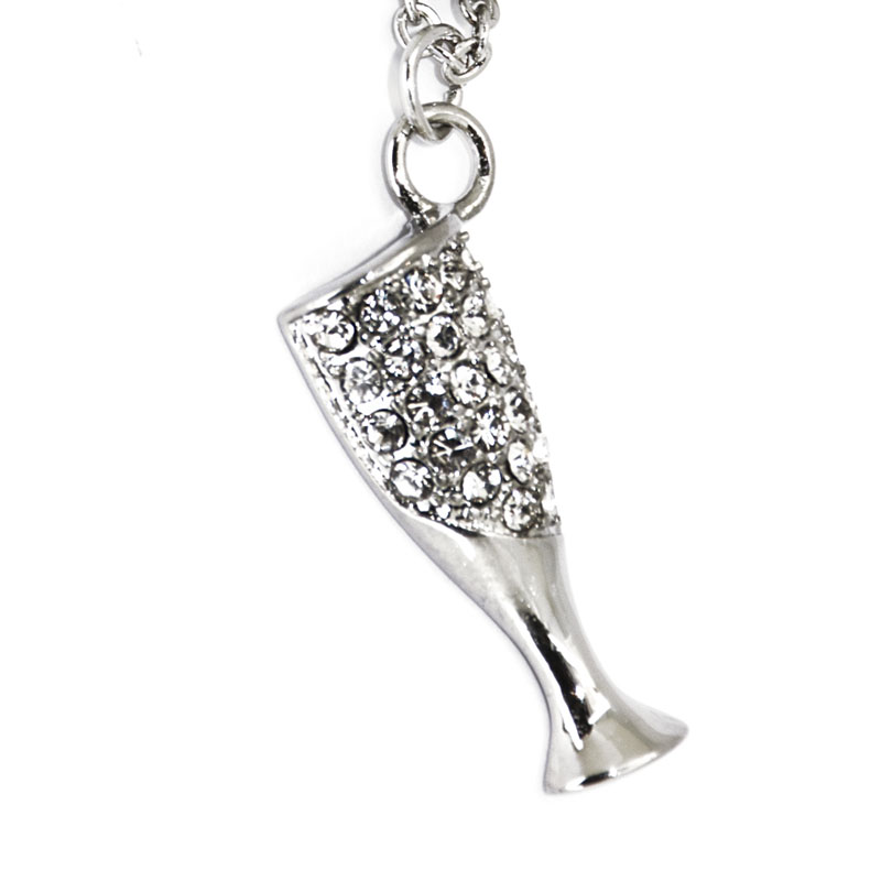 Collar Acero NK con dije de estrella y de cáliz con piedras.