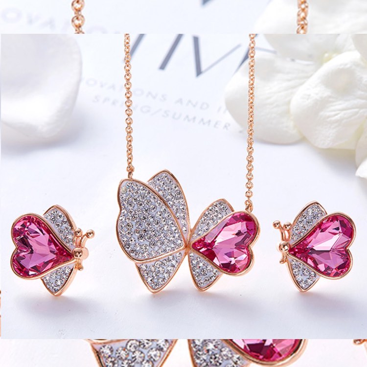 Juego de aretes y collar de mariposa con cristal de Swarovski, oro rosa. 