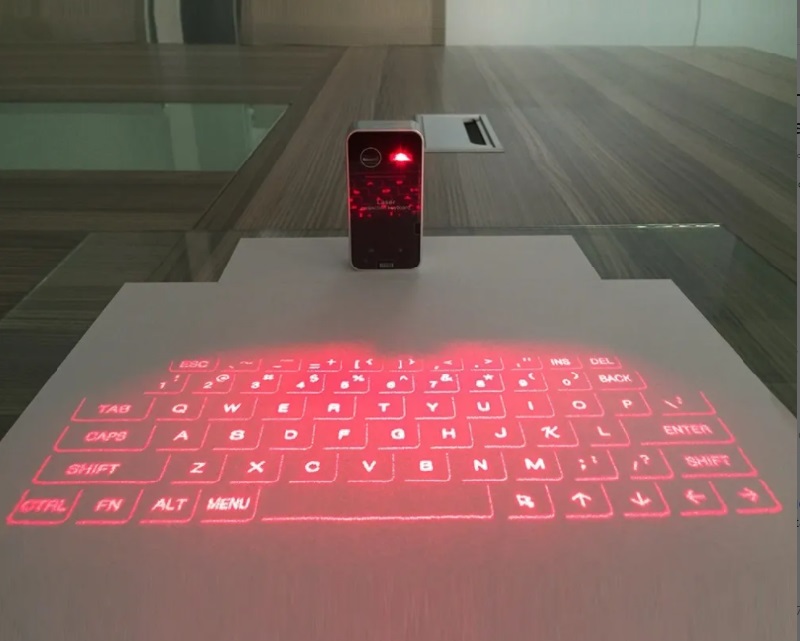 Teclado láser inalámbrico con bluetooth recargable.