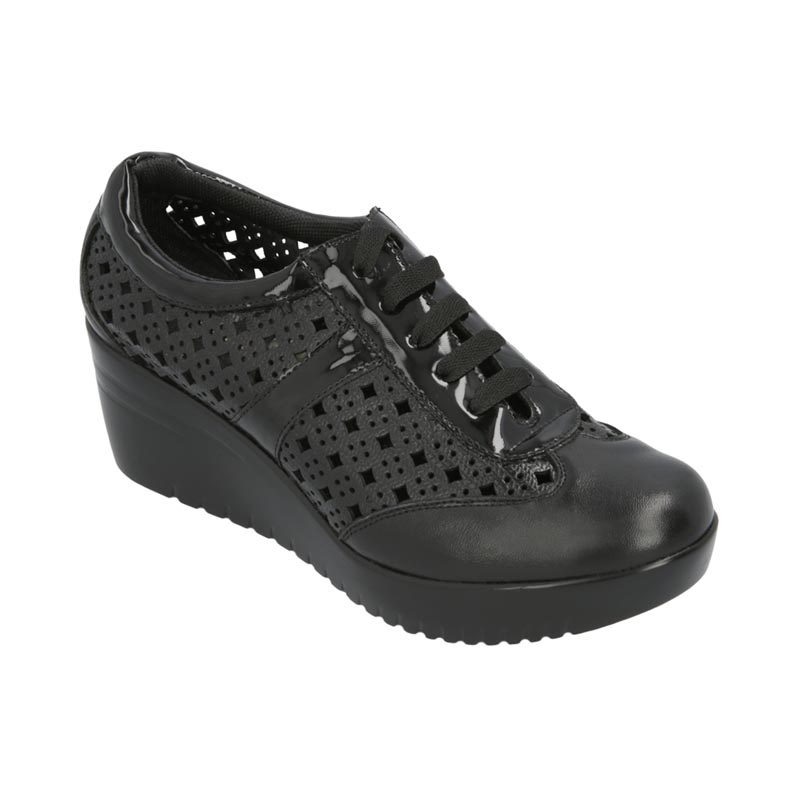 Tenis de cuña para mujer en parte superior de piel de becerro negra y plantilla de piel de cerdo.
