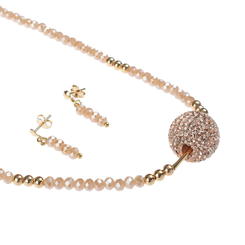 Juego de Collar y Aretes dije Bola de Fuego color Beige.