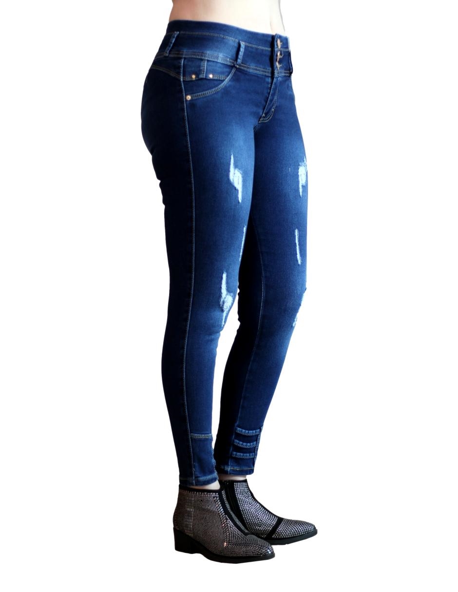 Jeans skinny de mezclilla stretch color azul medio con destrucción