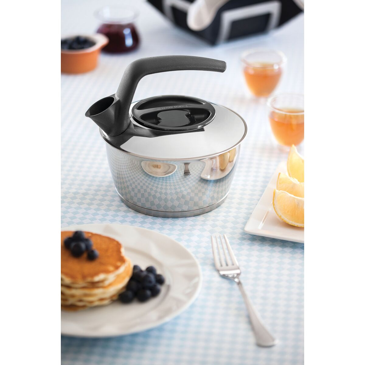 Tetera Tramontina 61485/160 de acero inoxidable con fondo triple mango negro 1,5 L END1