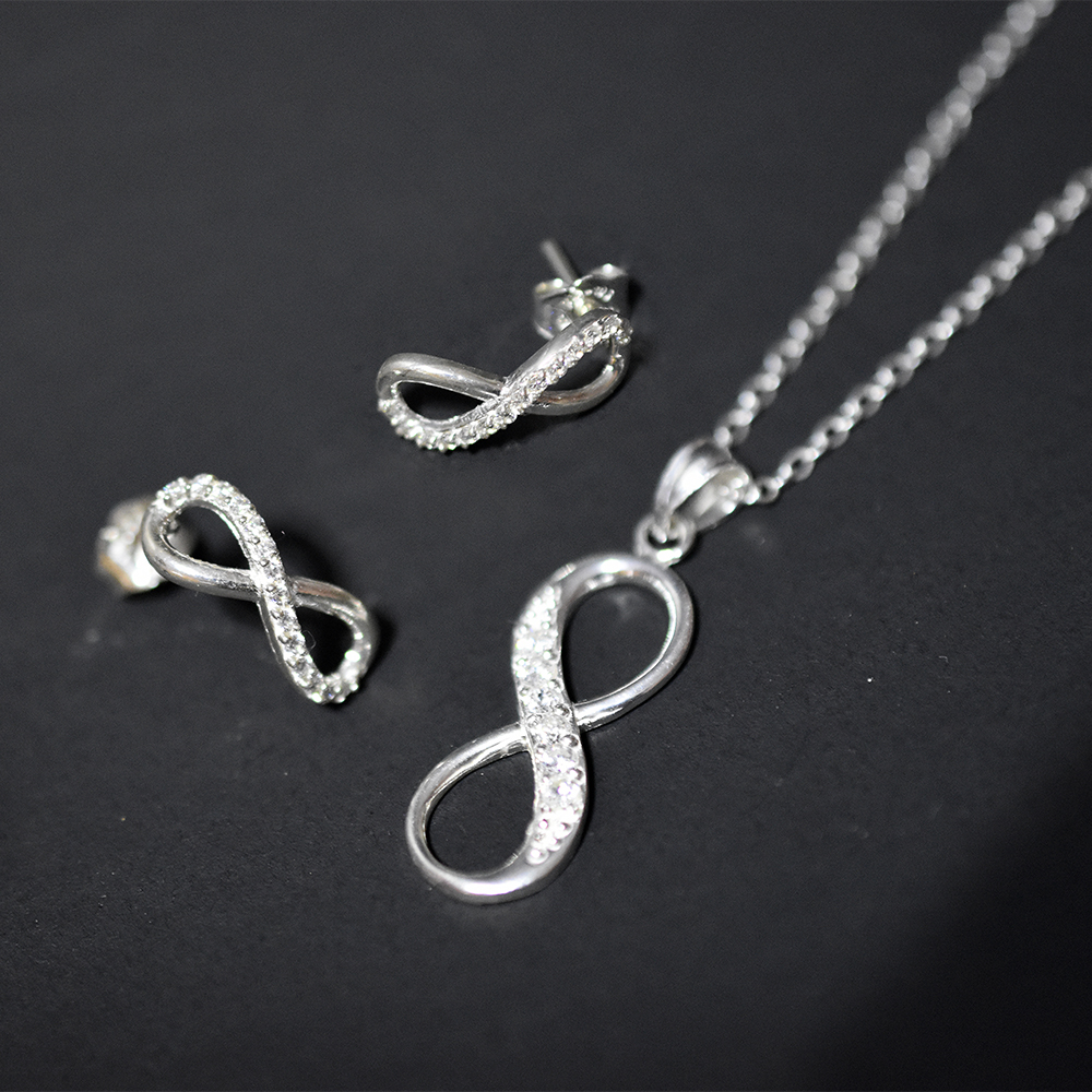 Juego Dije y Aretes Infinito con cristal Plata Ley 925