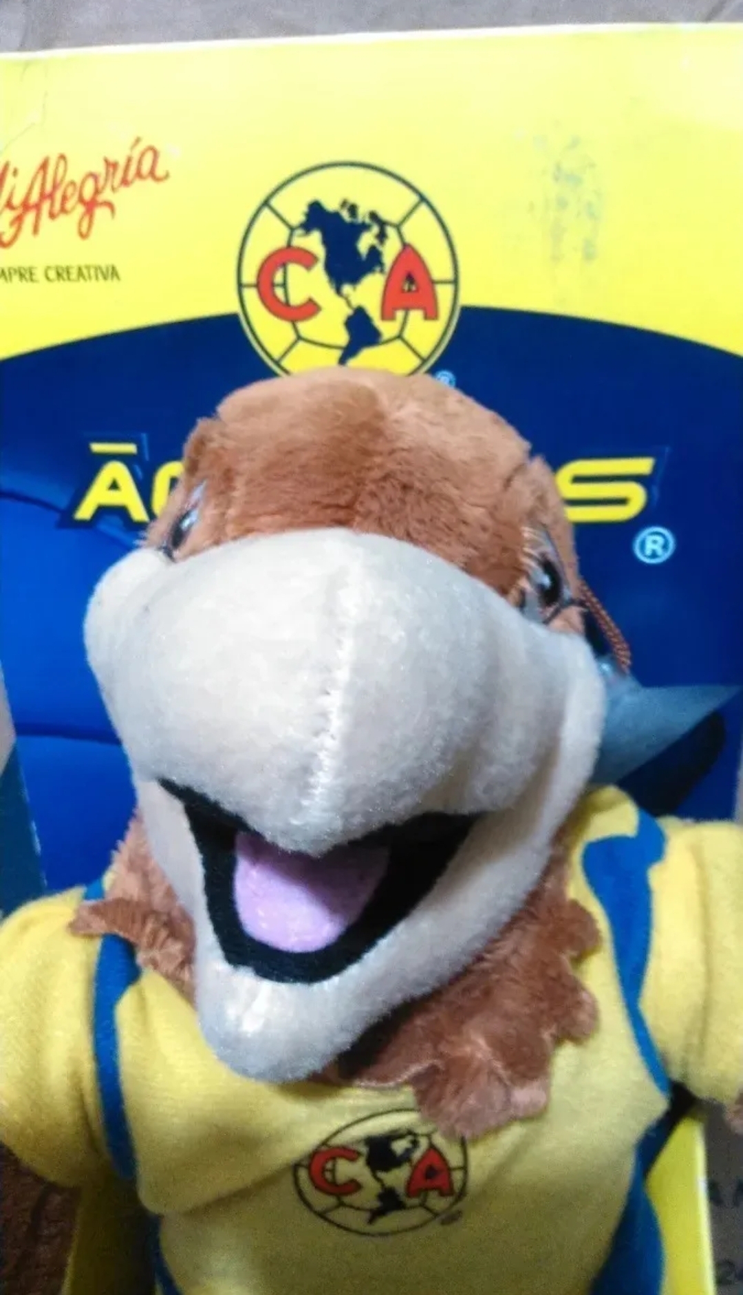 MASCOTA DE PELUCHE AMERICA MUSICAL MI ALEGRIA 