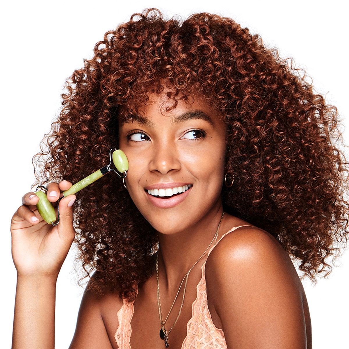 Rodillo de masaje facial 100 porciento Jade Revlon