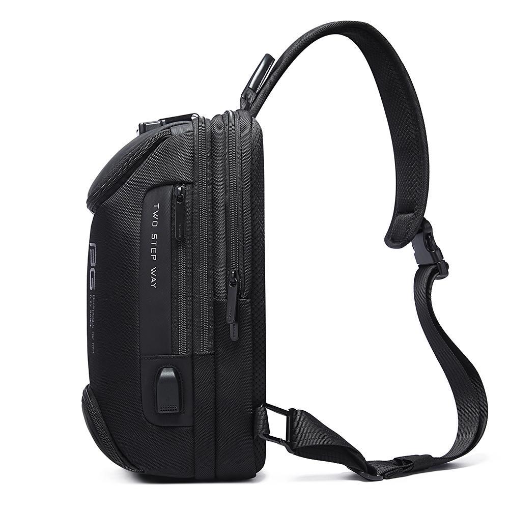 Mochila Cruzada Bange. Sistema antirrobo programable. Carga USB. Material resistente al agua. Compartimientos para tablet de 9.7 y más. Modelo BG-7082