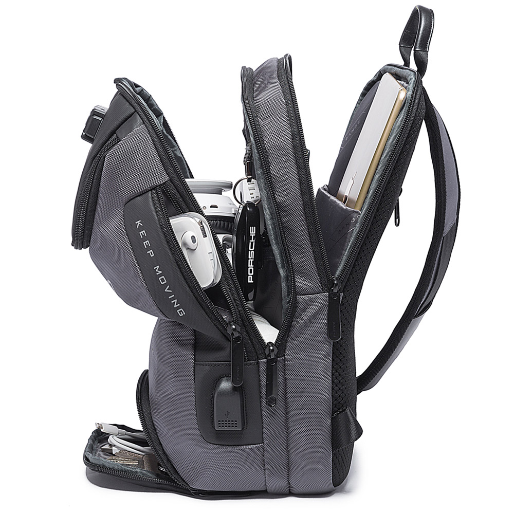 Mochila Cruzada Bange. Sistema antirrobo programable. Carga USB. Material resistente al agua. Compartimientos para tablet de 9.7 y más. Modelo BG-7082