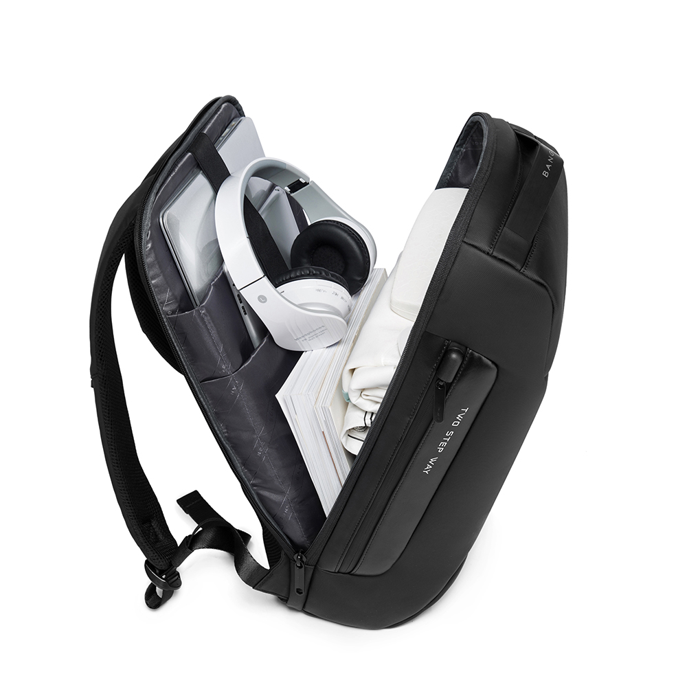  Mochila BANGE. Para laptop, iPad y artículos extra. Candado de seguridad antirrobo, puerto de carga USB y material repelente al agua. Modelo BG-7216