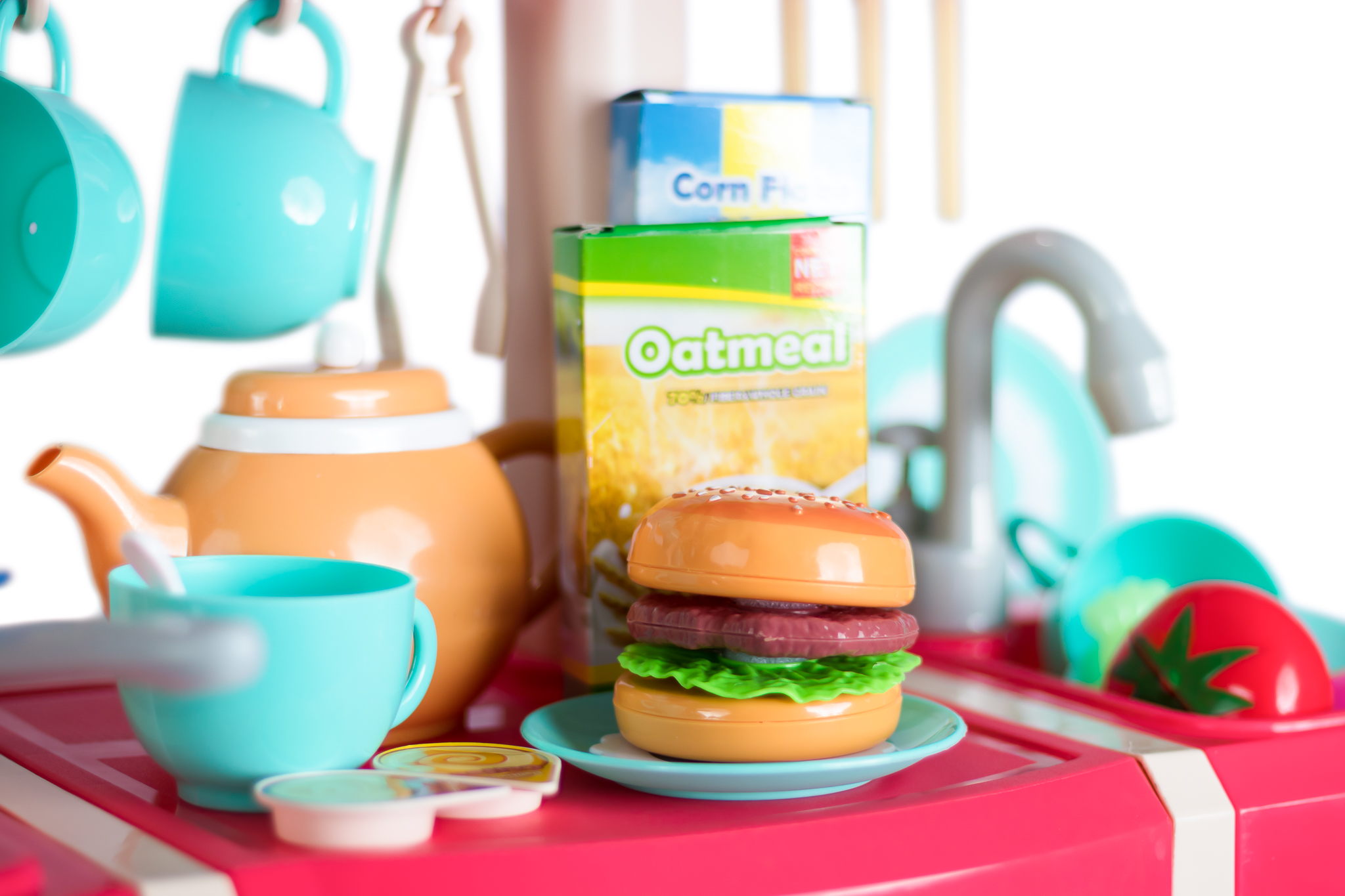 Cocina de juguete interactiva con efectos de luz, sonido, vapor, cocción y agua, color rosa