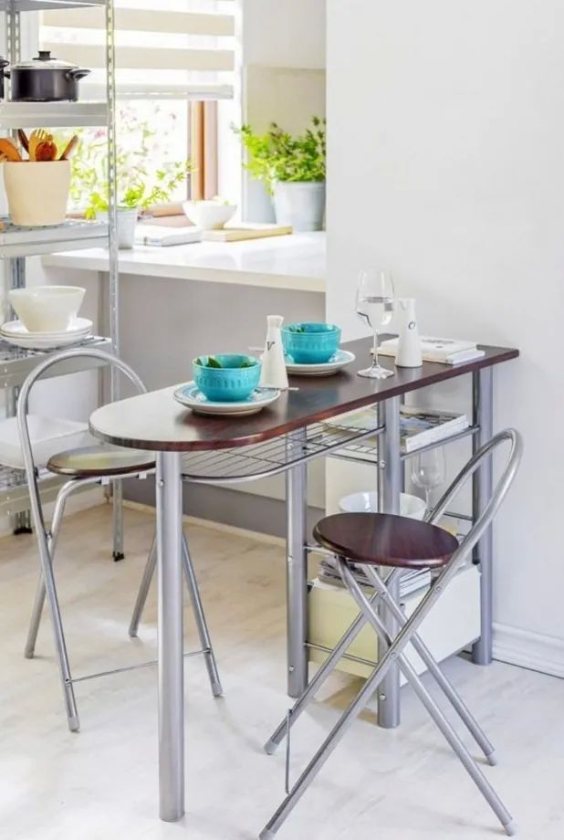 Desayunador plegable con dos sillas 