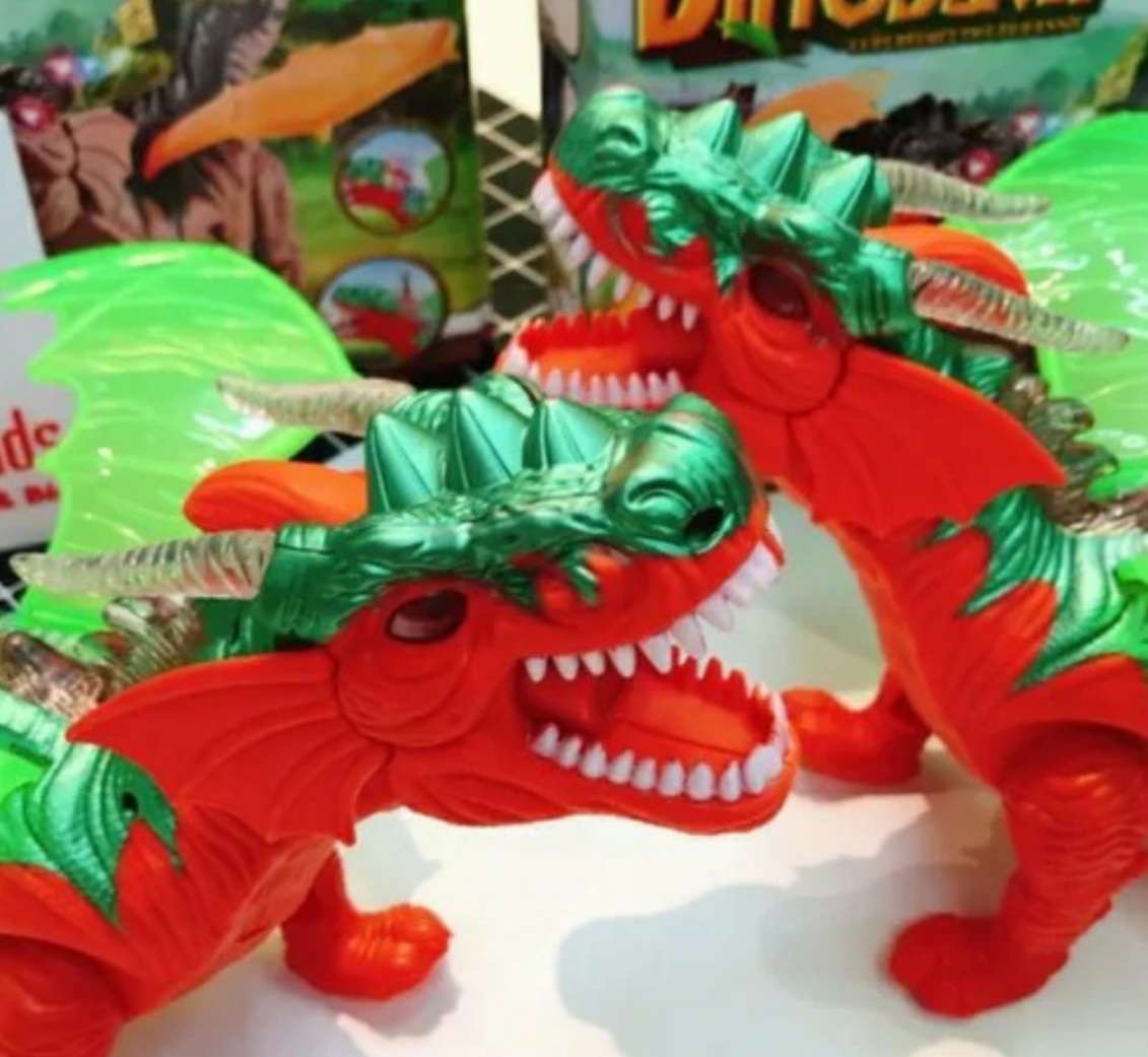 Dinosaurio Naranja Con Proyector Y Pone Huevos Camina Luces Y Sonido