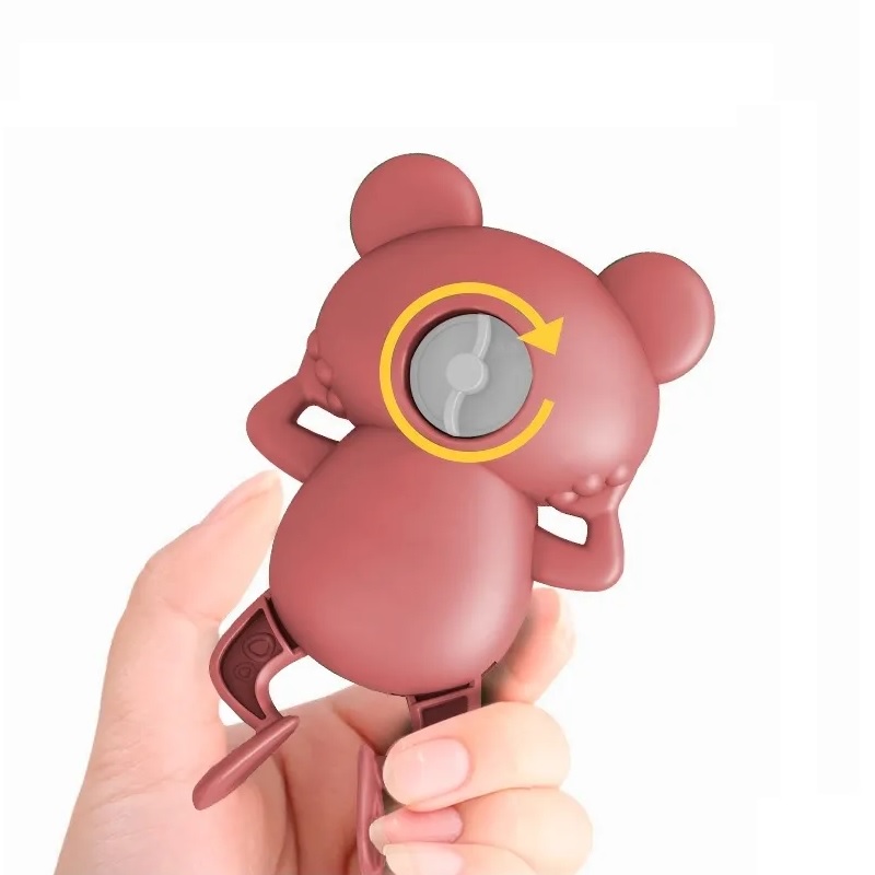 Juguete de baño para niños. Rana nadadora a cuerda