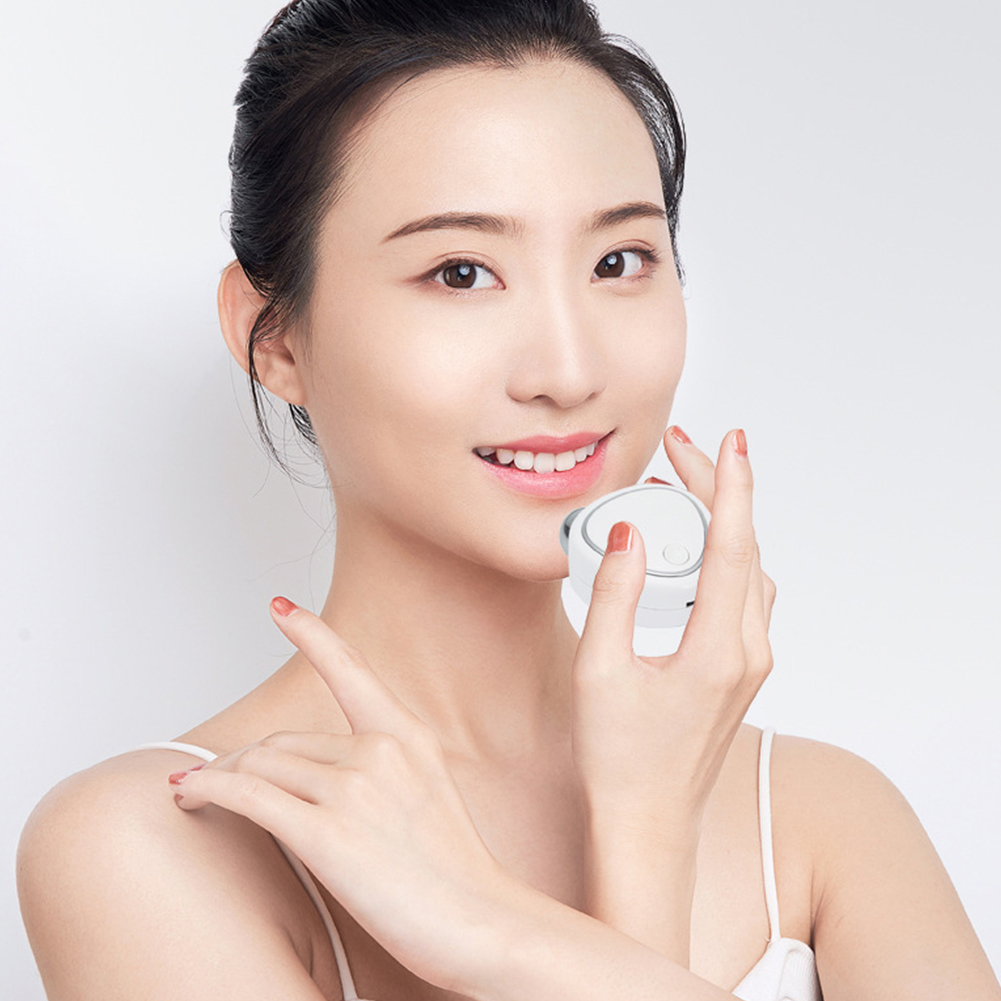 Mini Masajeador facial con rodillo EMS 