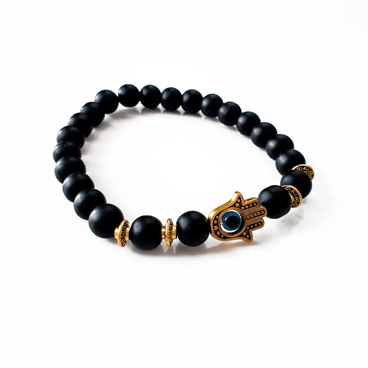 Pulsera ojo turco hombre de ónix mate con mano de Fátima dorada