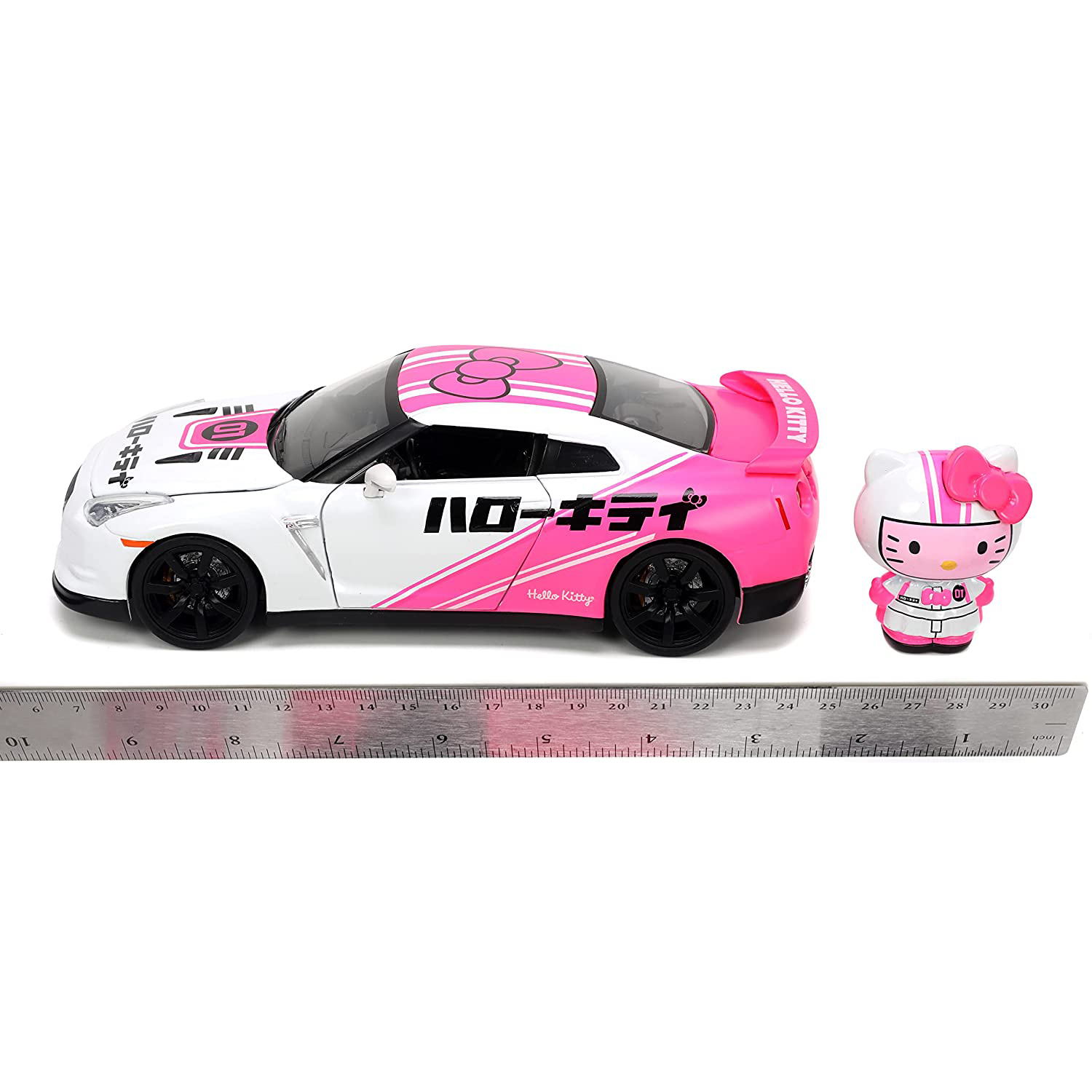 2009 Nissan Skyline GT-R R35 con Figura Hello Kitty Tokyo Speed Jada Toys Escala 1:24 