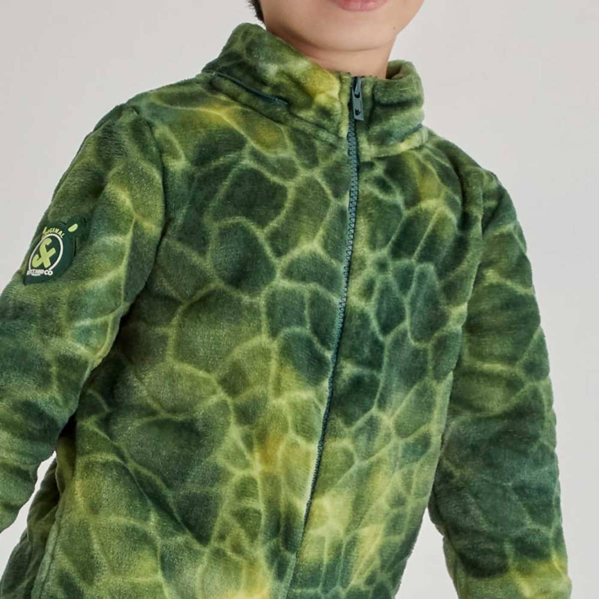 Mameluco 3D marca Next & Co. para niño de dinosaurio, color verde, con capucha desmontable. 