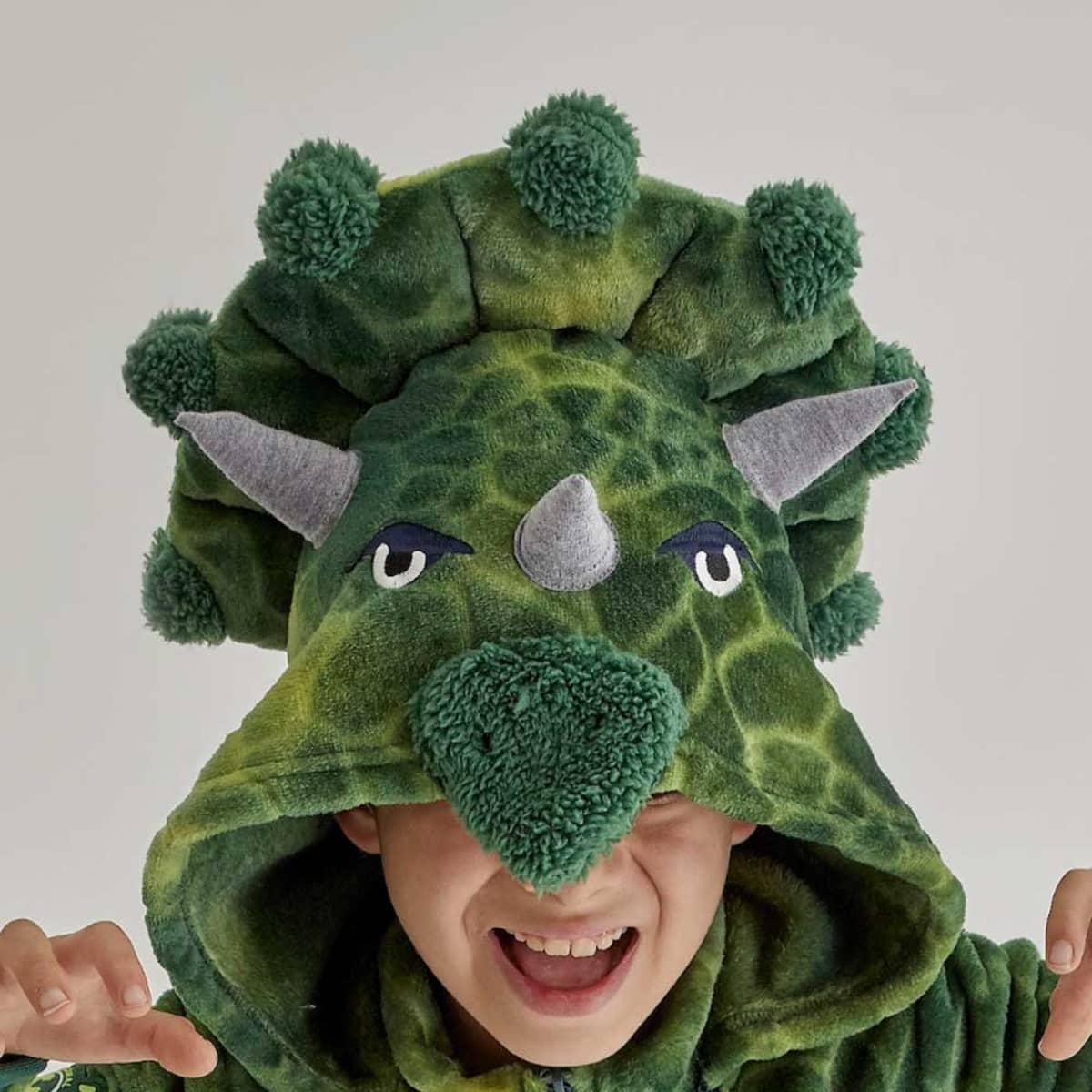 Mameluco 3D marca Next & Co. para niño de dinosaurio, color verde, con capucha desmontable. 