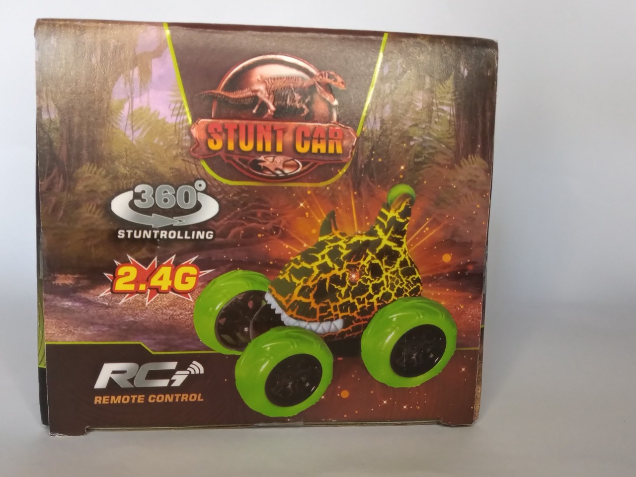 Carro Stun Car Cabeza De Dinosaurio Jurásico Radio Control Verde