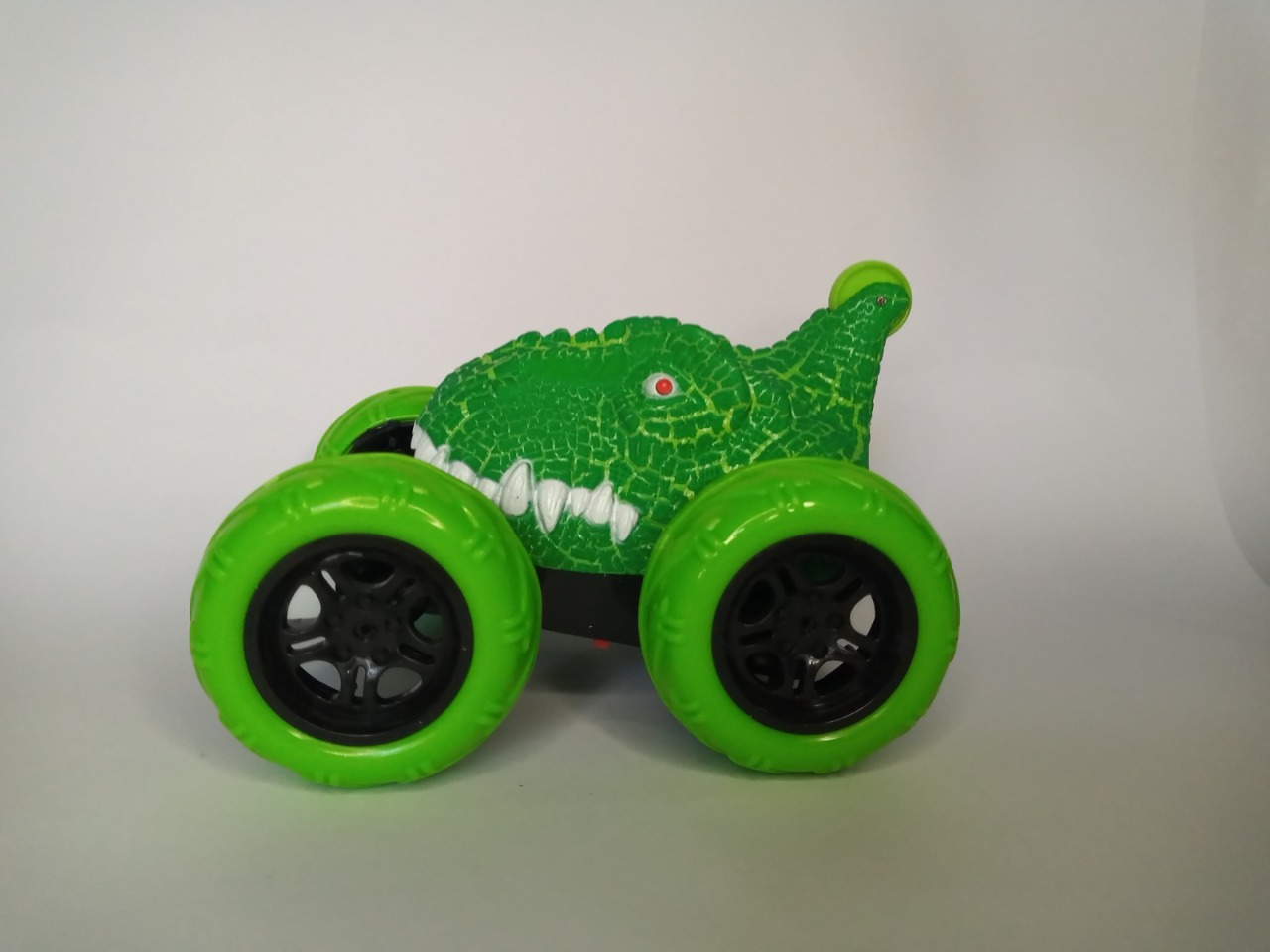Carro Stun Car Cabeza De Dinosaurio Jurásico Radio Control Verde