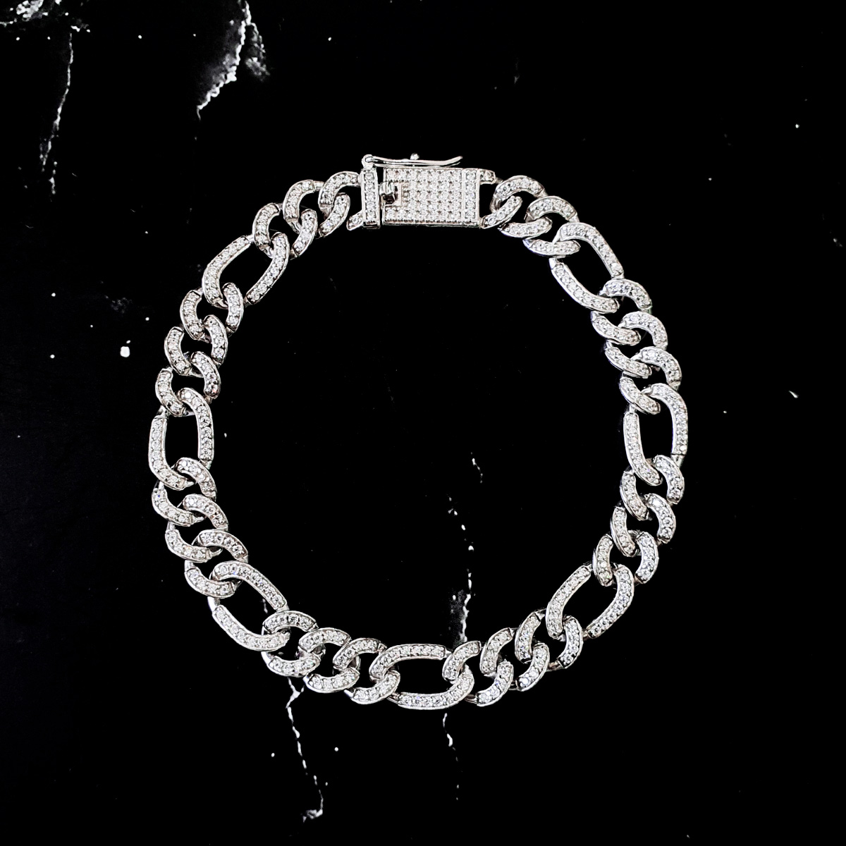 Esclava figaro de zirconias de plata .925 con baño de rodio y broche de caja