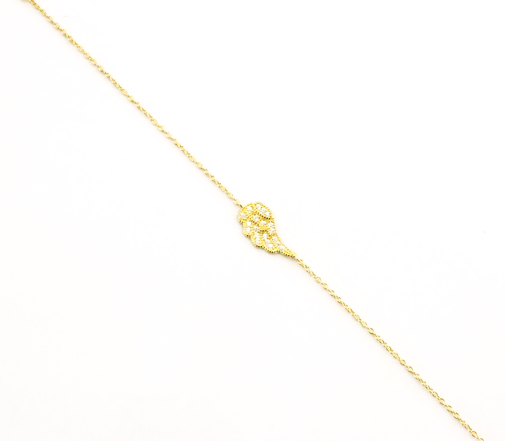 Pulsera de plata 925 con baño de oro de 24k con dije en forma de ala