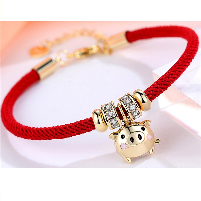 Pulsera De Cerdito Dorado Con Cuerda Roja