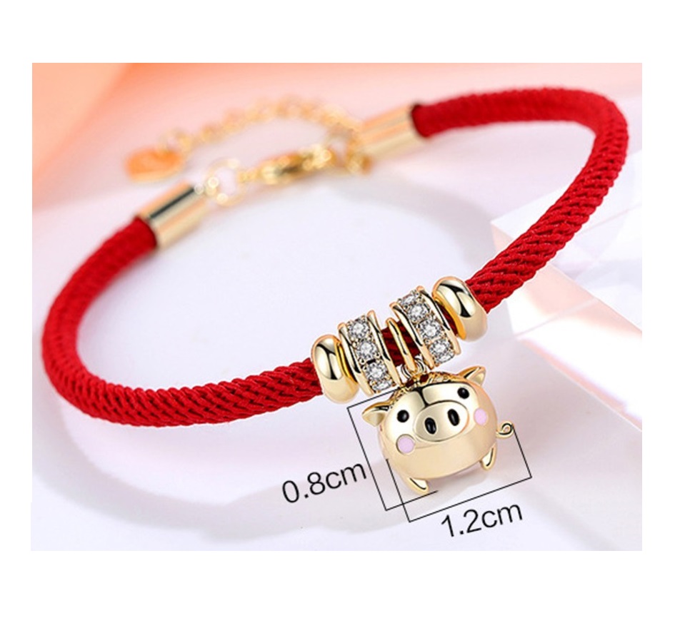 Pulsera De Cerdito Dorado Con Cuerda Roja