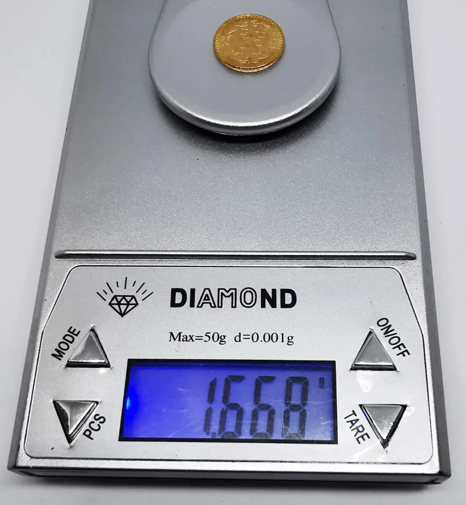 Moneda de oro 2 Pesos oro hidalgo En Su Capsula.