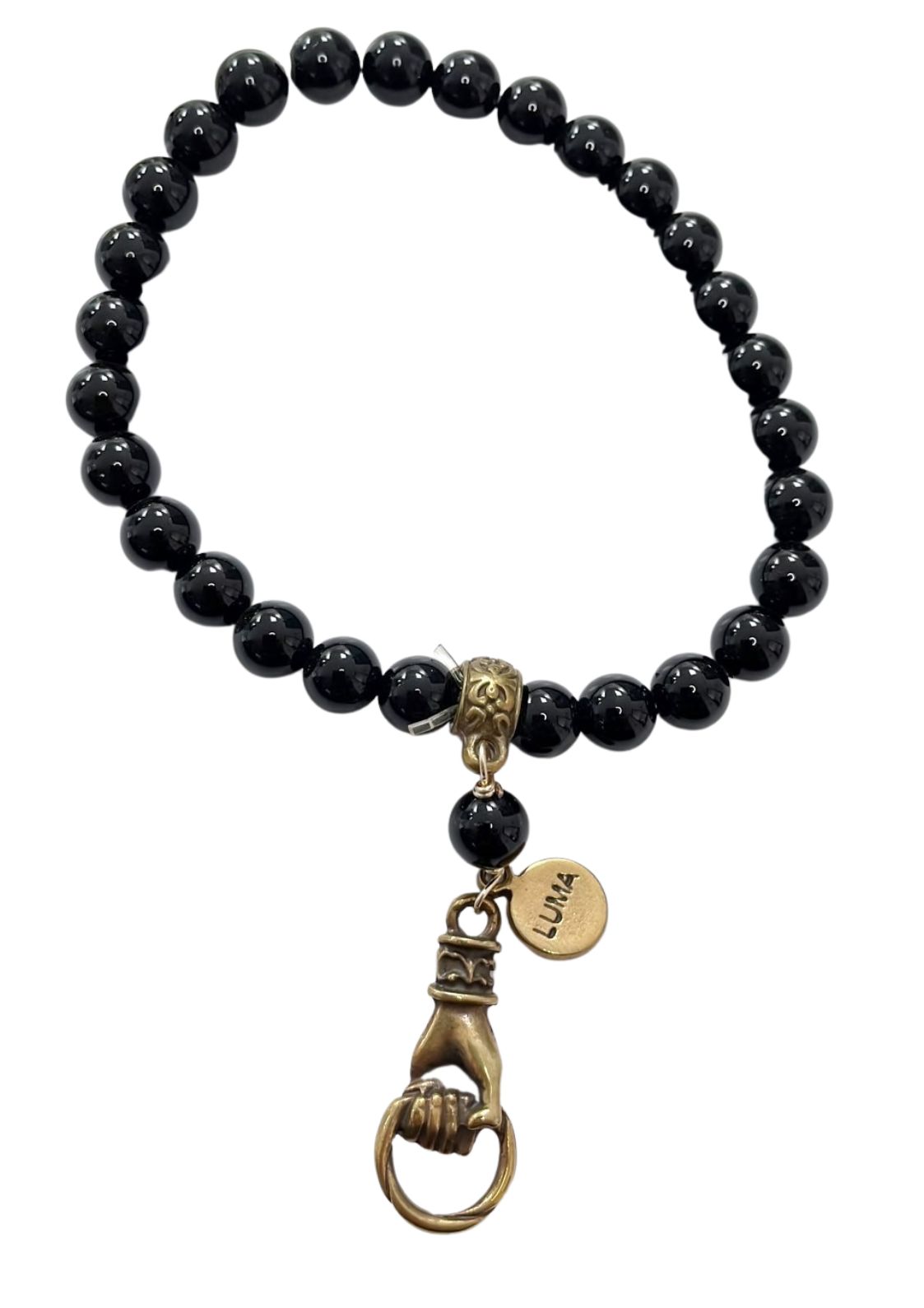 Pulsera Negra De Ágatas Con Dije Metalico De Mano Luma