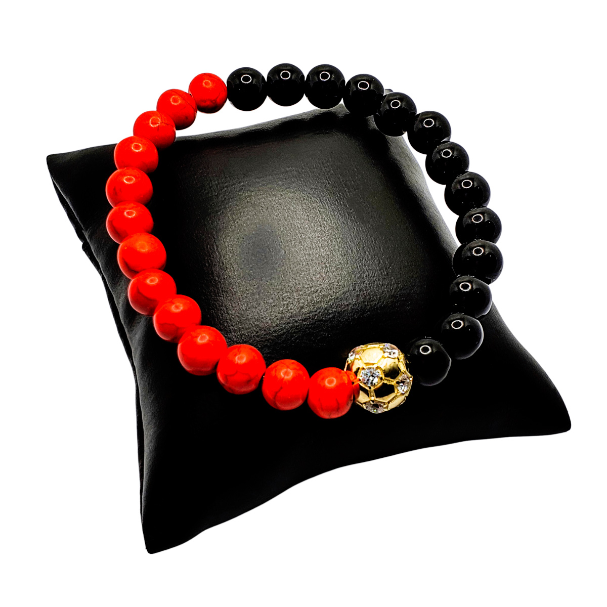 Pulsera balón de fútbol rojinegra con ónix brillante y piedra roja. Incluye caja de regalo.