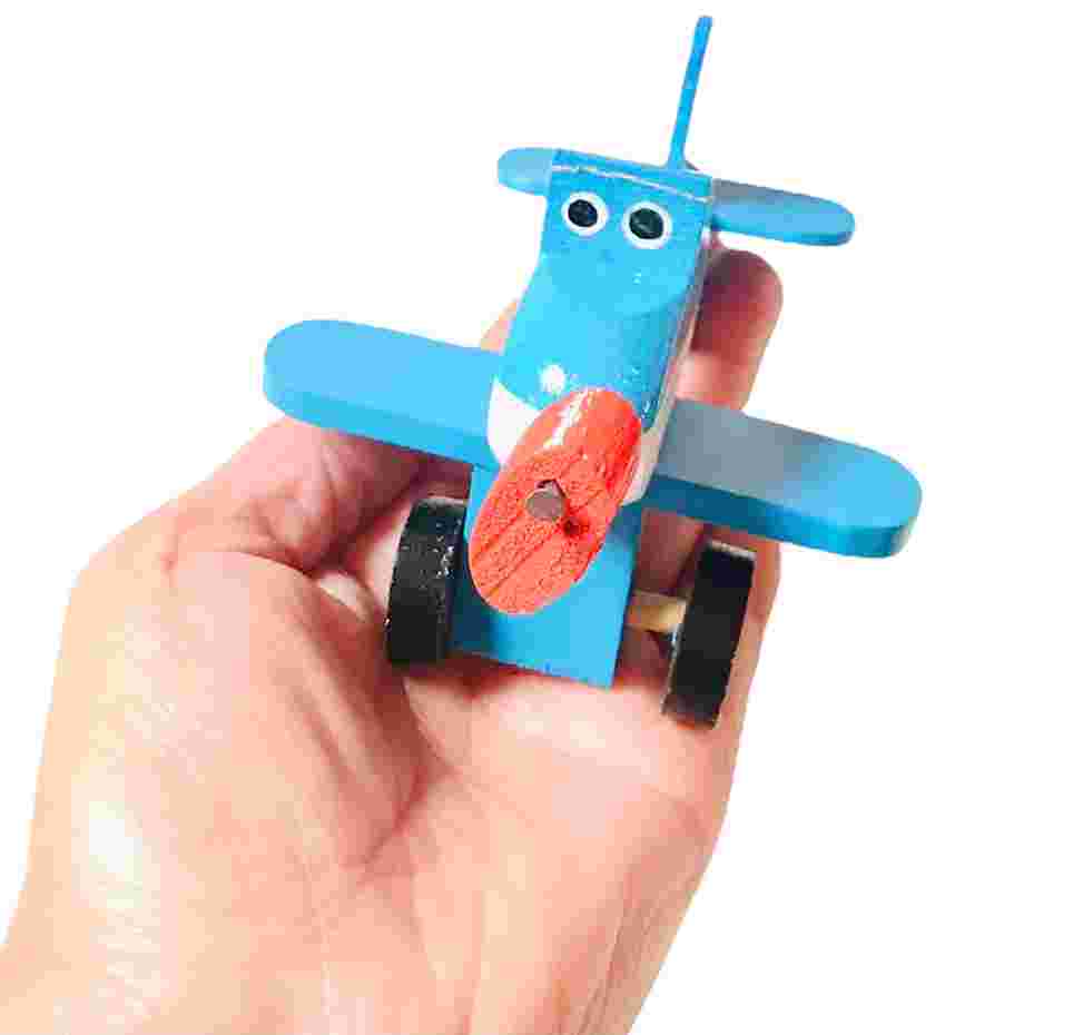 Avioncito colorido de madera juguete típico mexicano