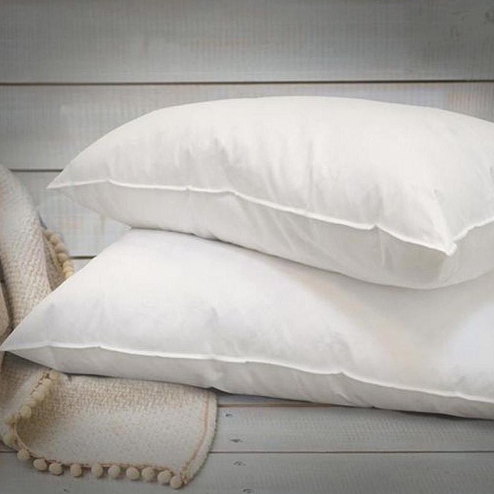 Juego 2 Almohadas Suaves Sensación Pluma Ganso con cierre Kyuden Home.