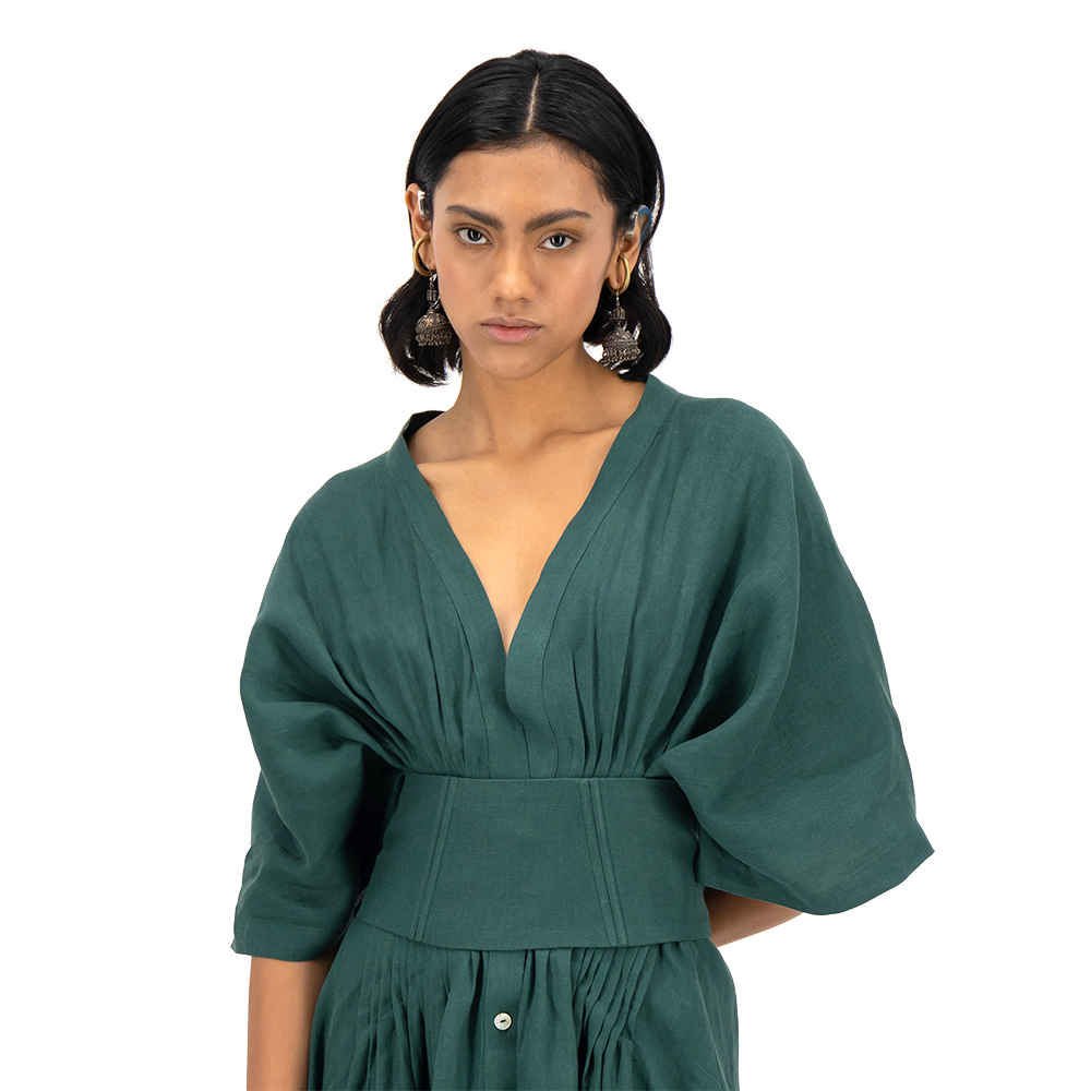 Vestido largo con corsette Merkabá x Dafne Canales verde botella lino