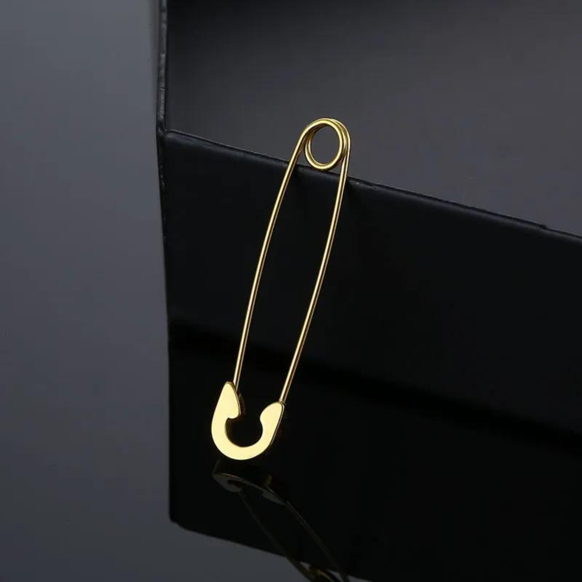 Aretes en Forma de Seguro 