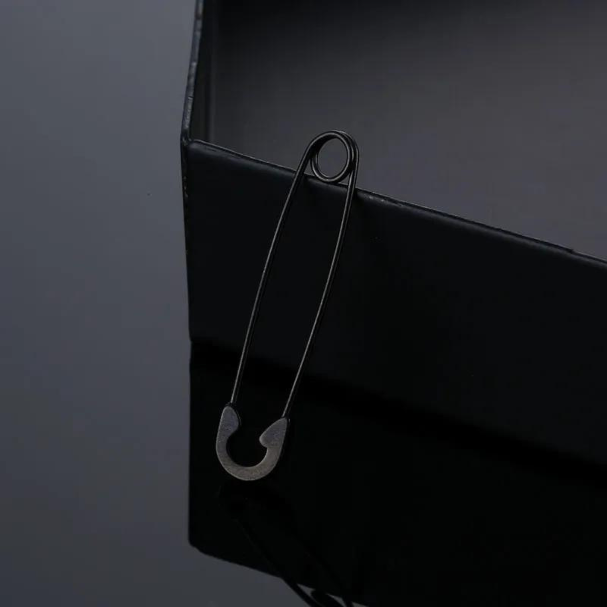 Aretes en Forma de Seguro 