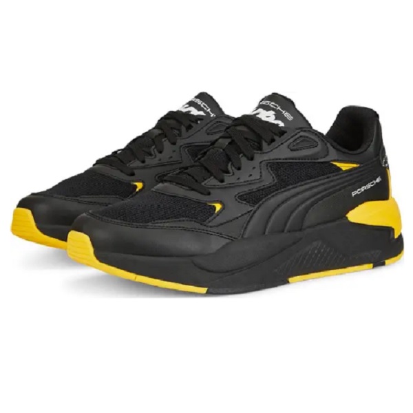 Tenis puma negro con amarillo sale