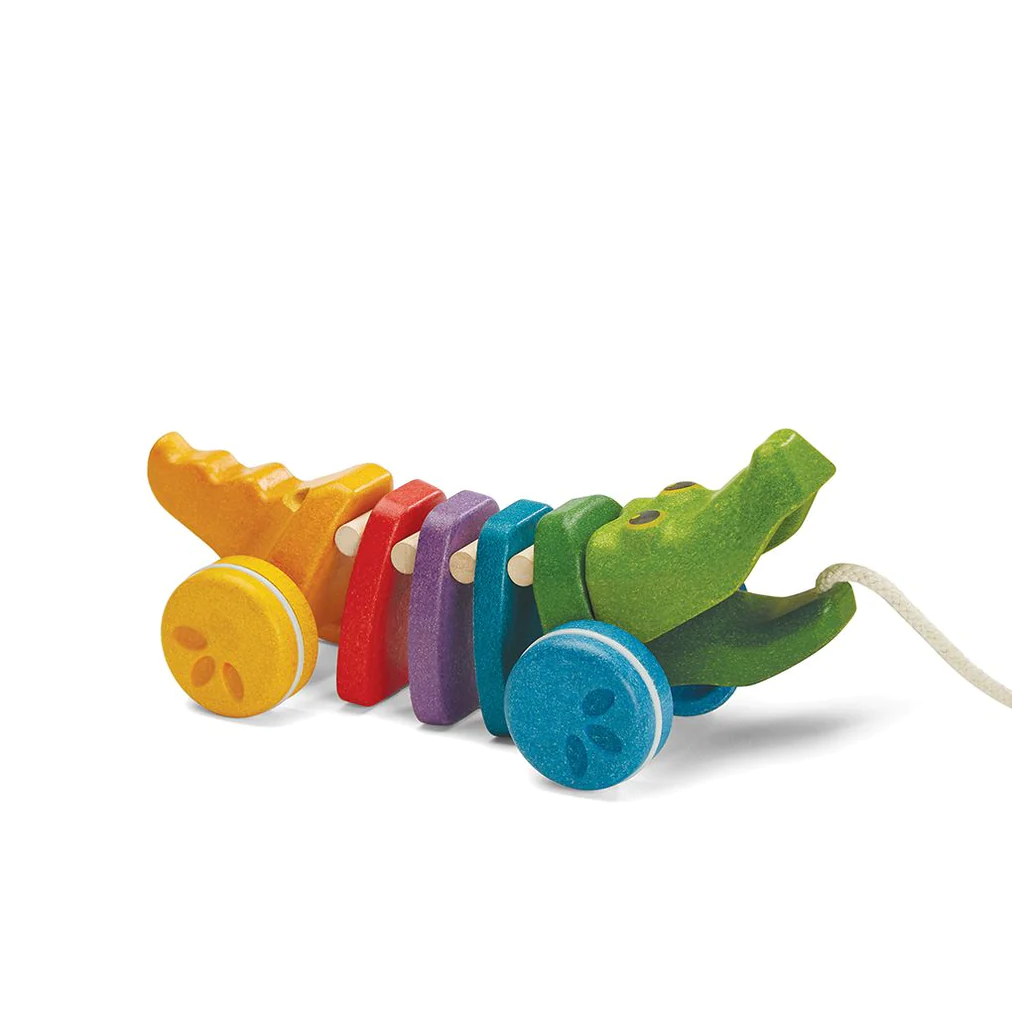 Cocodrilo Plan Toys juguete didáctico de madera para jalarlo multicolor.