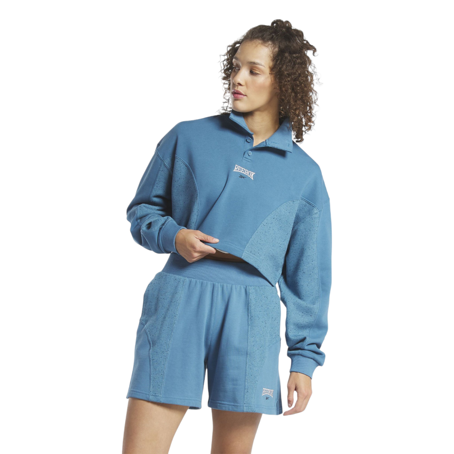 CHAMARRA REEBOK MUJER AZUL REEBOK VARSITY COVERUP HS0369.